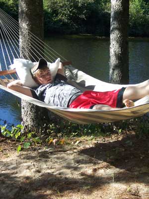Boy relaxing in a hammock